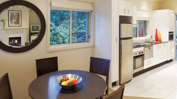 Apartment, 2 Bedrooms, Courtyard Area | Living area | 32-inch LCD TV with digital channels, TV, fireplace