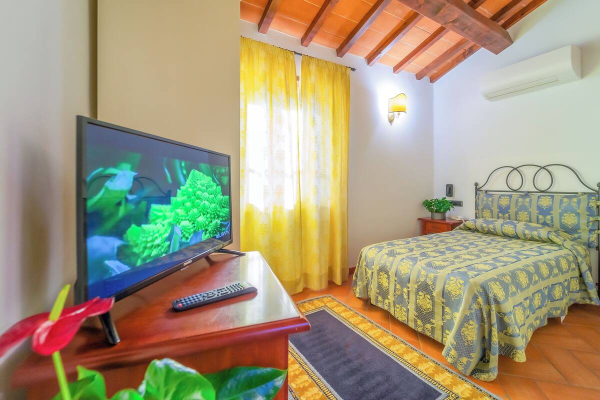 Economy Room, City View | Minibar, desk, blackout curtains, free WiFi