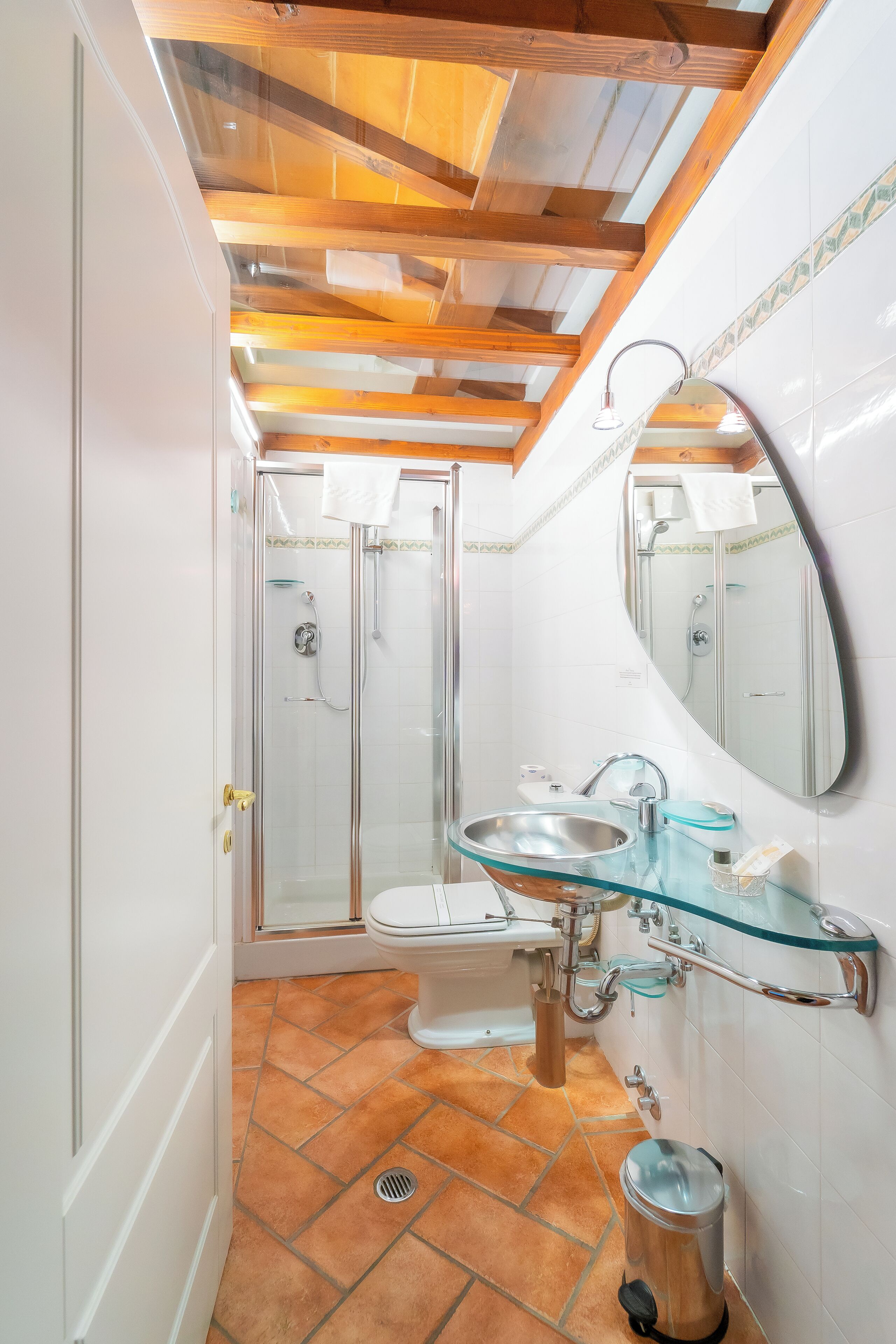 economy room, city view | bathroom | shower, free toiletries, hair dryer, towels