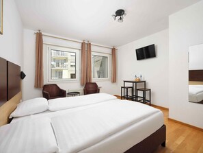 Studio | Select Comfort-bedden, een kluis op de kamer, geluiddichte muren