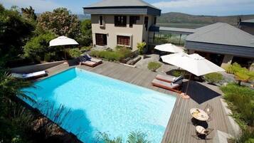Outdoor pool, pool umbrellas, pool loungers