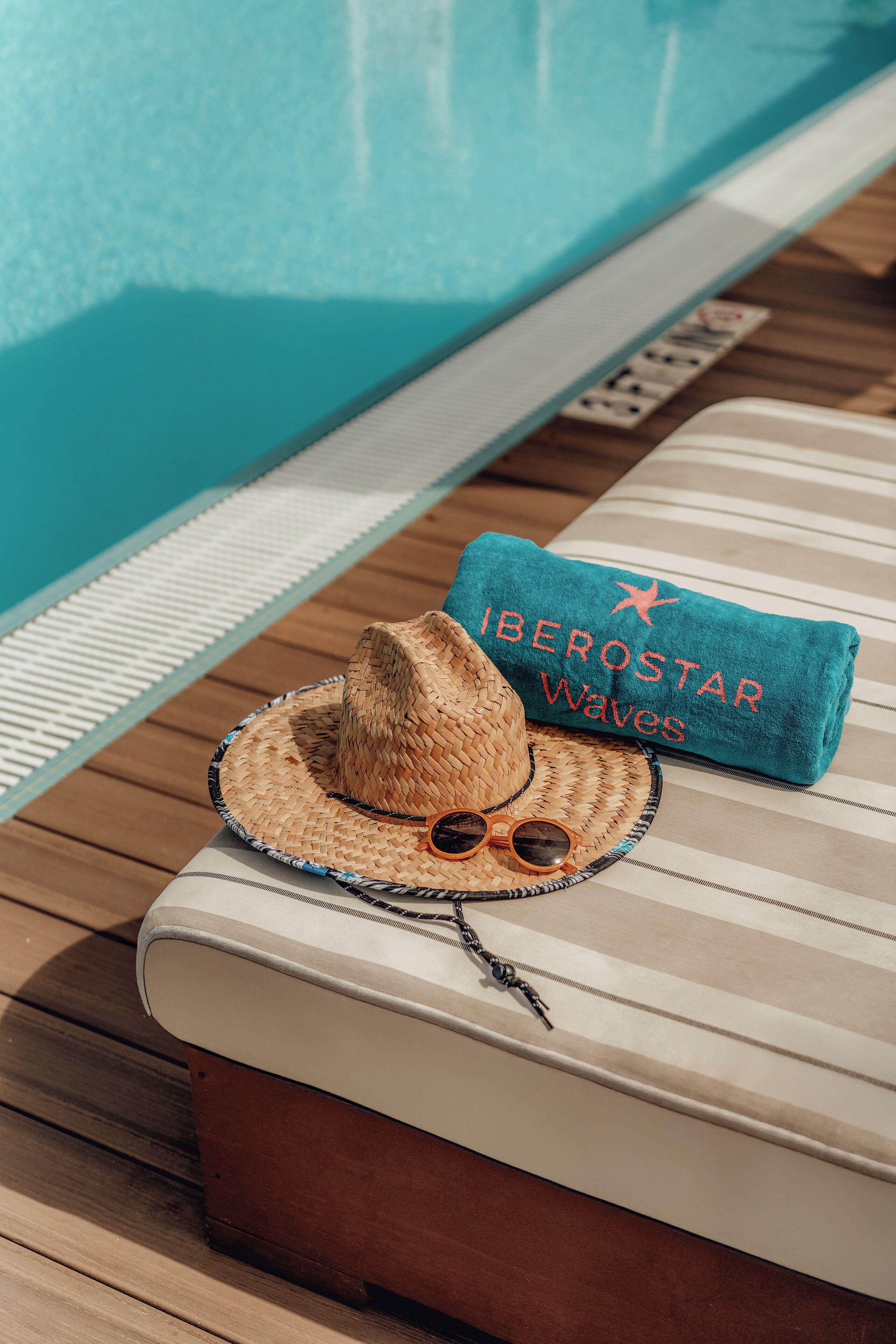 outdoor pool, open 8:00 am to 8:00 pm, pool umbrellas, pool loungers