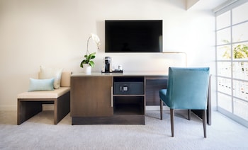 Premium bedding, down comforters, in-room safe, desk at Iberostar Waves Miami Beach