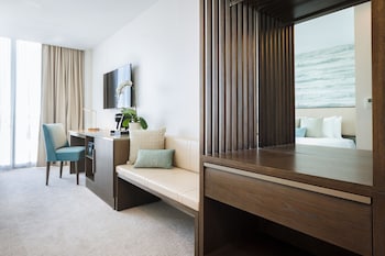 Premium bedding, down comforters, in-room safe, desk at Iberostar Waves Miami Beach