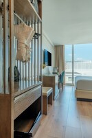 Premium bedding, down comforters, in-room safe, desk