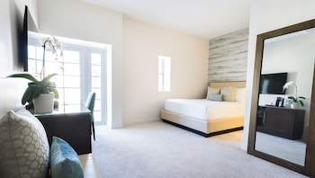 Premium bedding, down comforters, in-room safe, desk at Iberostar Waves Miami Beach