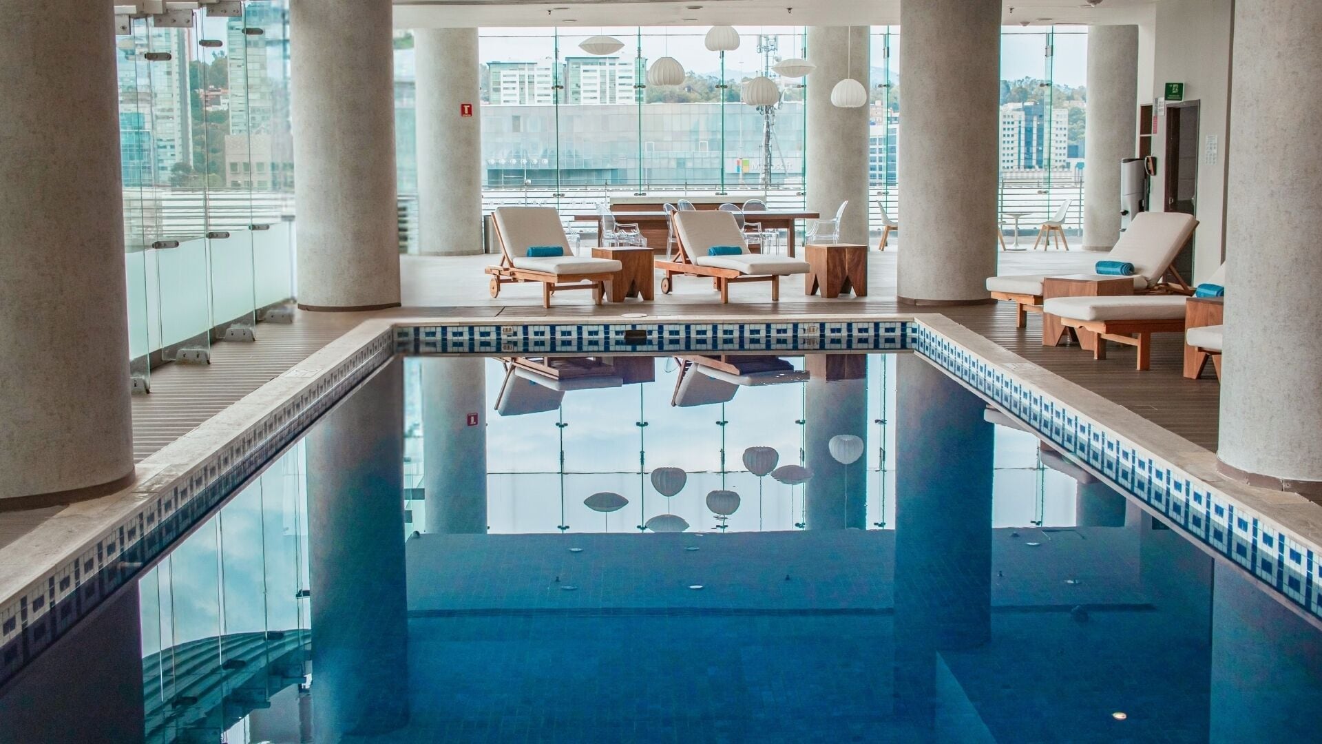 indoor pool, open 7:00 am to 10:00 pm, pool loungers