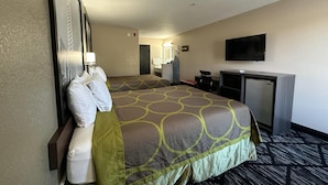 A hotel room with two beds, a desk, a television, and a mirror. - Super 8 by Wyndham Kinder/Coushatta near Casino (Kinder)
