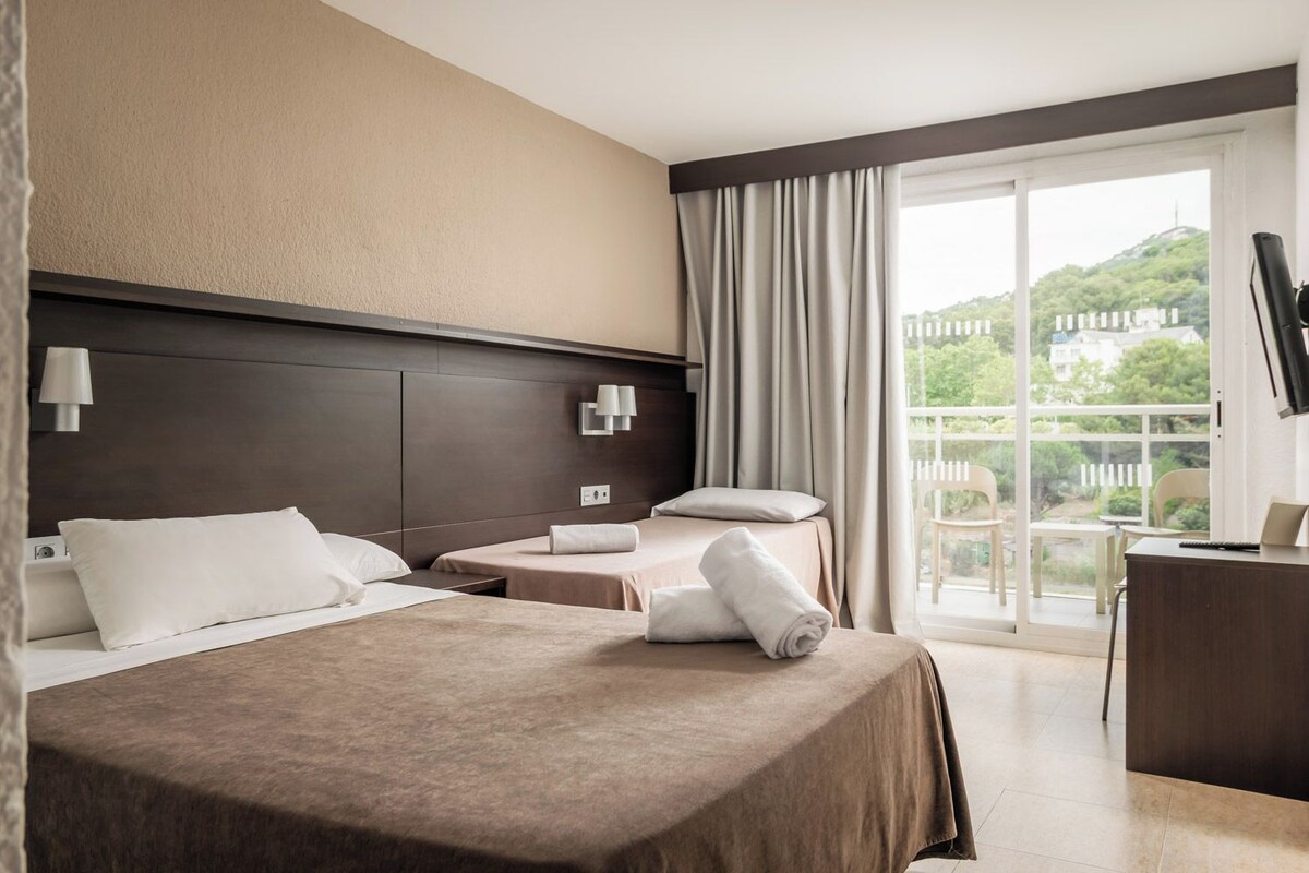 Room, Balcony, Pool View (2 adults + 1 child) | Down duvets, in-room safe, desk, blackout curtains