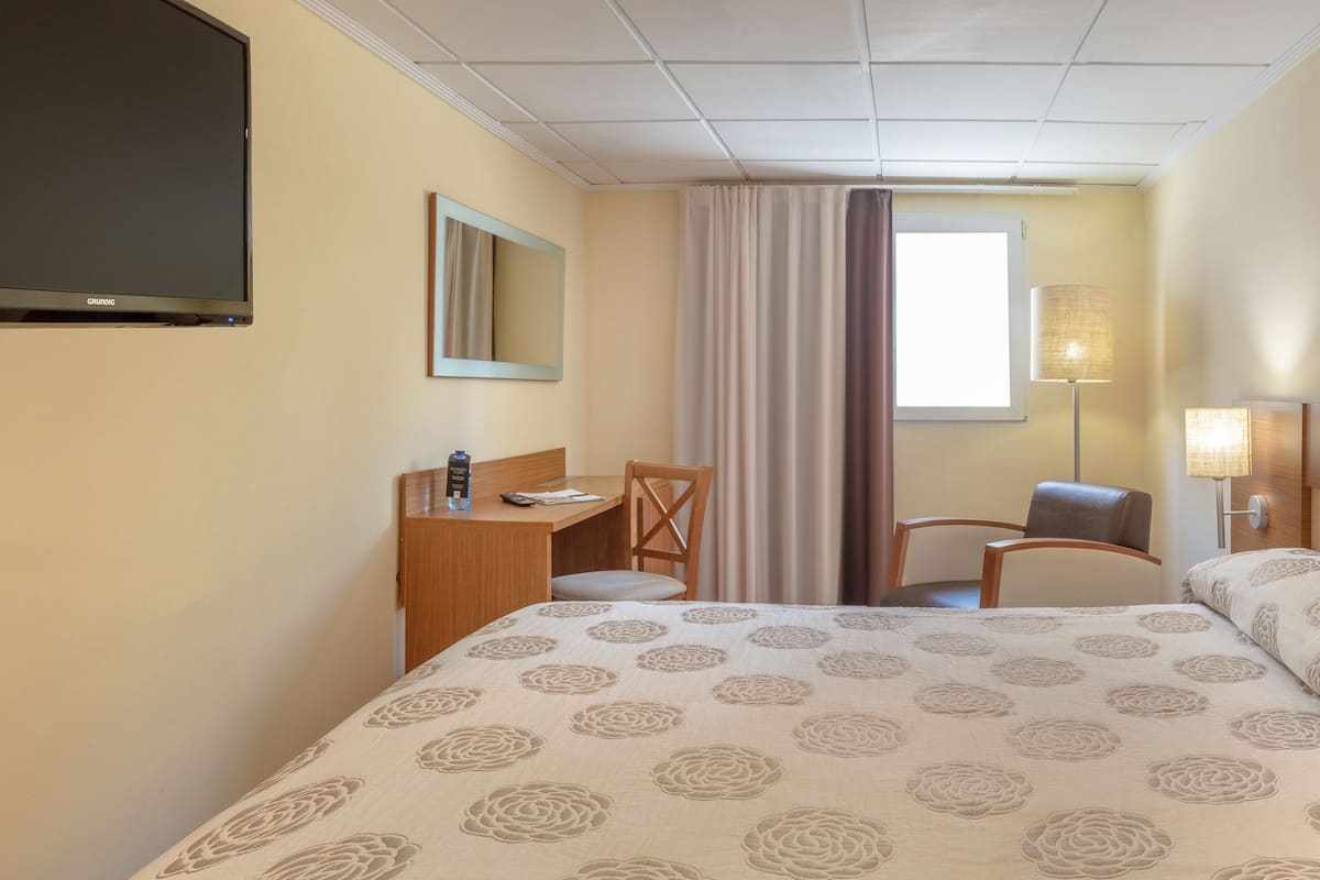 Chambre Simple | 1 chambre, minibar, coffres-forts dans les chambres, bureau