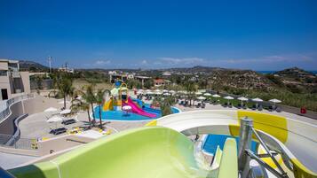 Seasonal outdoor pool, open 10:00 AM to 7:00 PM, pool umbrellas