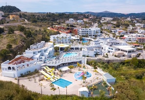 A resort with a pool, water slides, and a beach area. - Venezia Resort Hotel & Spa - All inclusive (Rhodes)