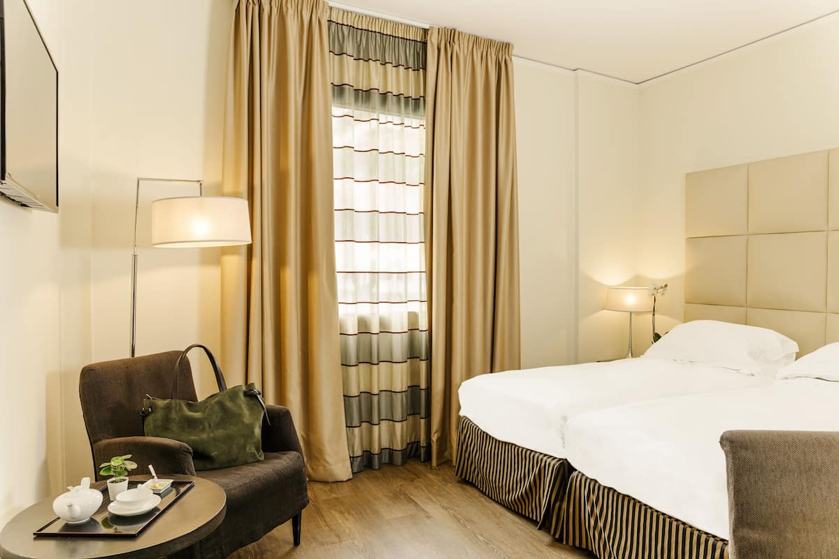 classic twin room, 2 single beds | premium bedding, in-room safe, desk, blackout curtains