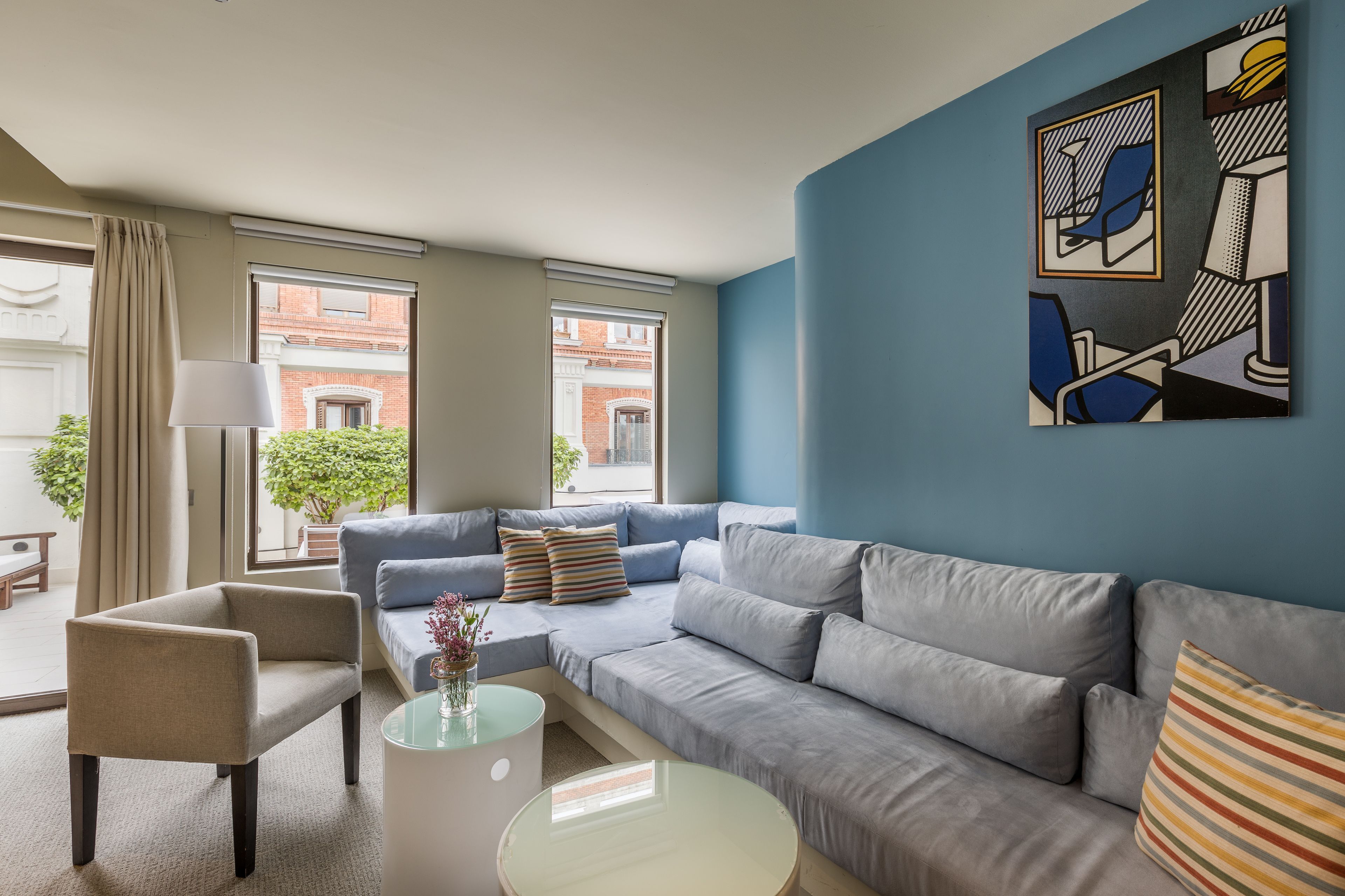 suite | living area | flat-screen tv