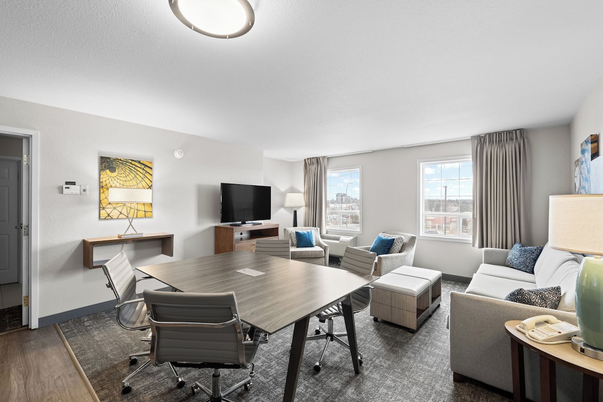 Suite, 1 Bedroom, Kitchen | Living area | 49-inch TV with cable channels, DVD player