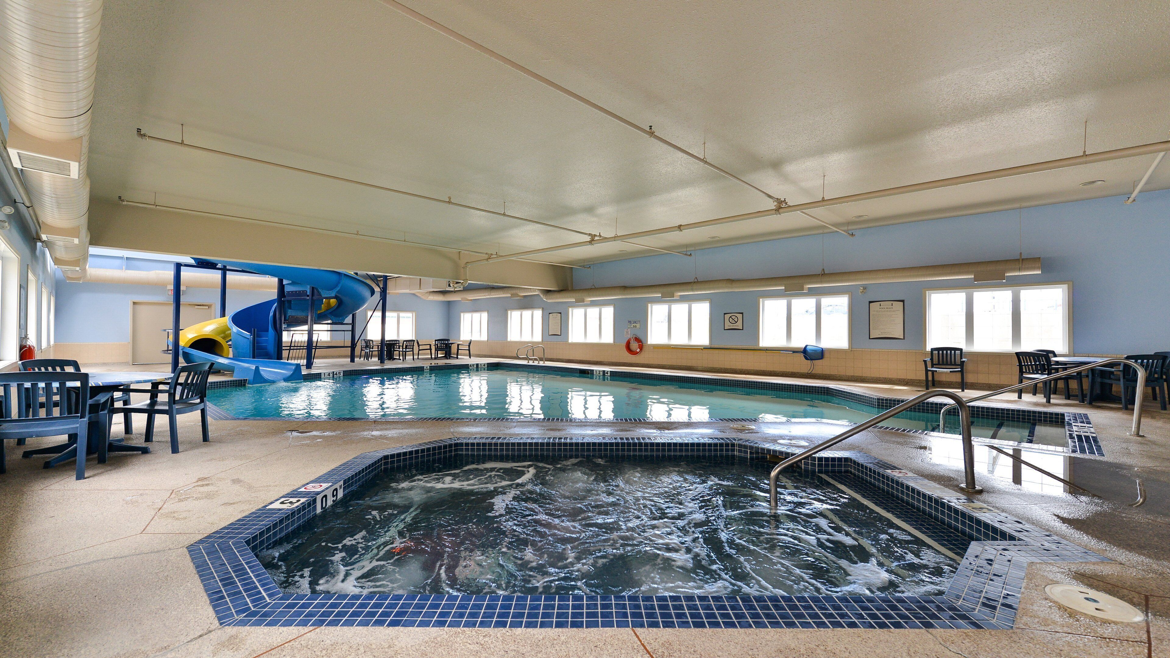 indoor pool, open 8:00 am to 10:00 pm, pool loungers