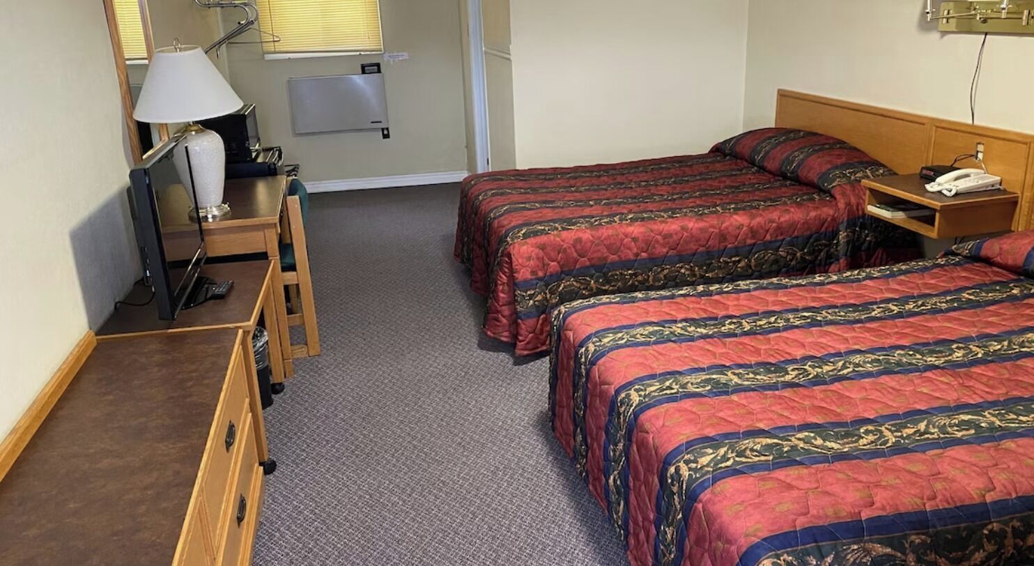 Zimmer, Mehrere Betten, Nichtraucher | Minibar, Bügeleisen/Bügelbrett, kostenloses WLAN, Bettwäsche