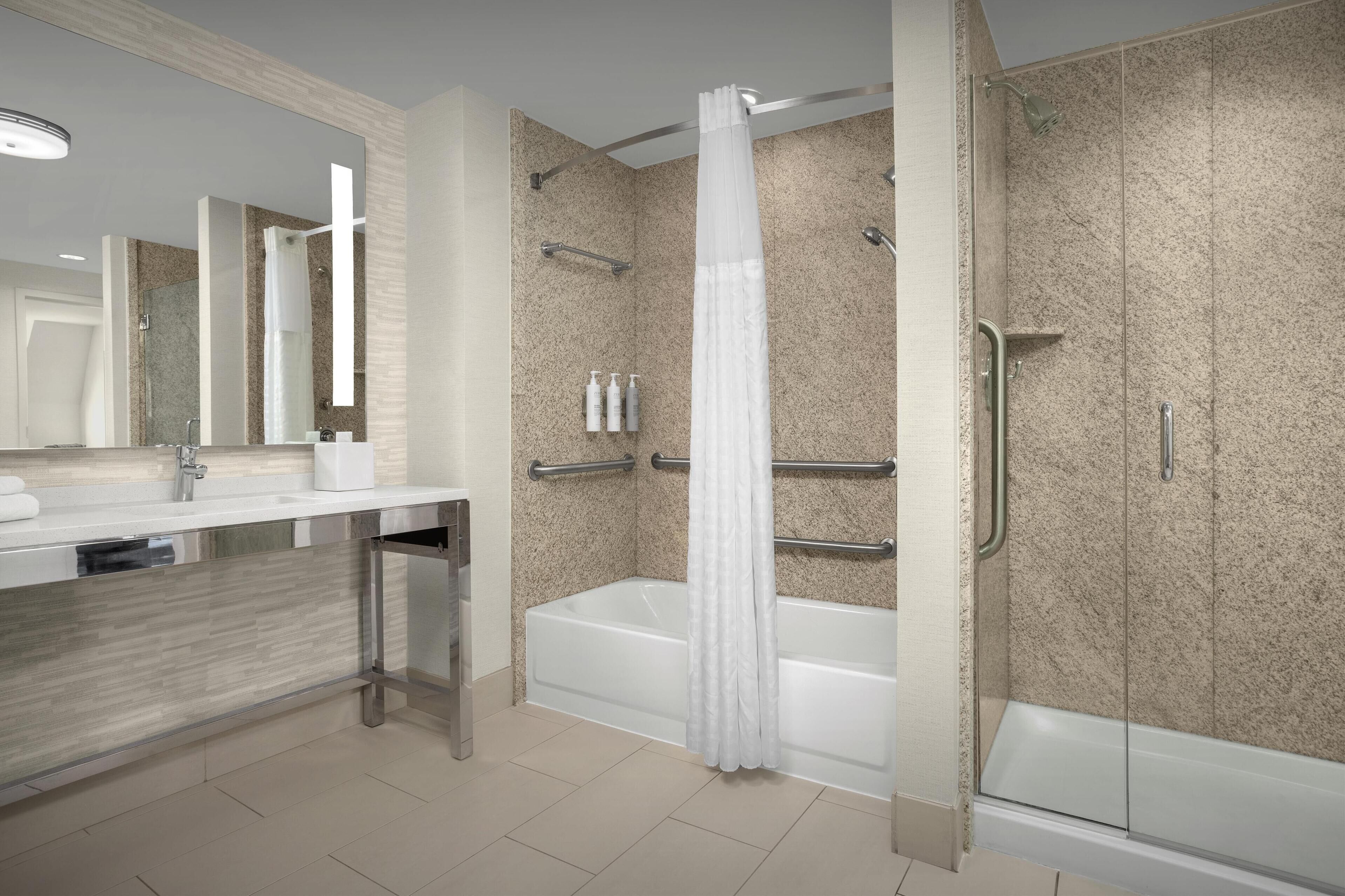 suite, 1 king bed, accessible, bathtub (mini fridge/microwave) | bathroom | free toiletries, hair dryer, towels