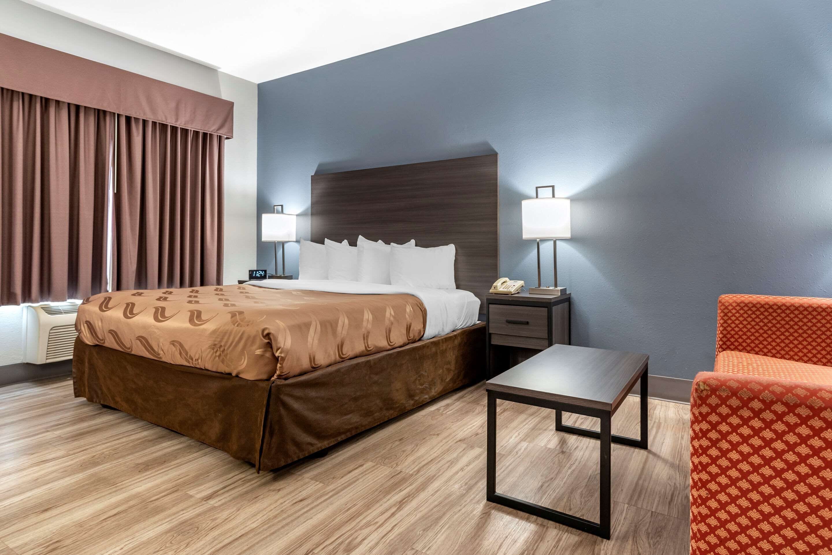 Suite, 1 King Bed, Non Smoking (Efficiency) | Desk, laptop workspace, blackout drapes, iron/ironing board