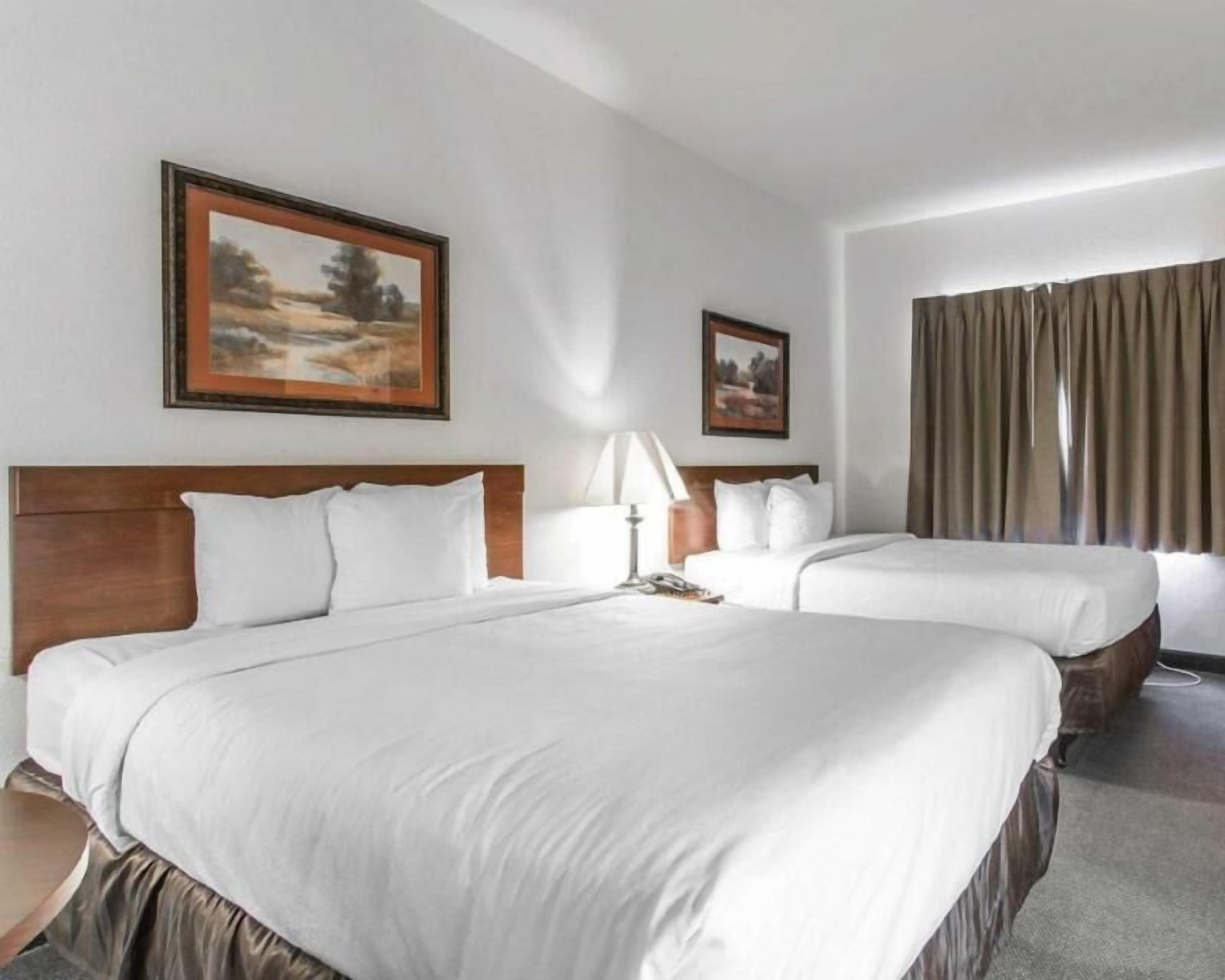 Desk, laptop workspace, blackout curtains, iron/ironing board