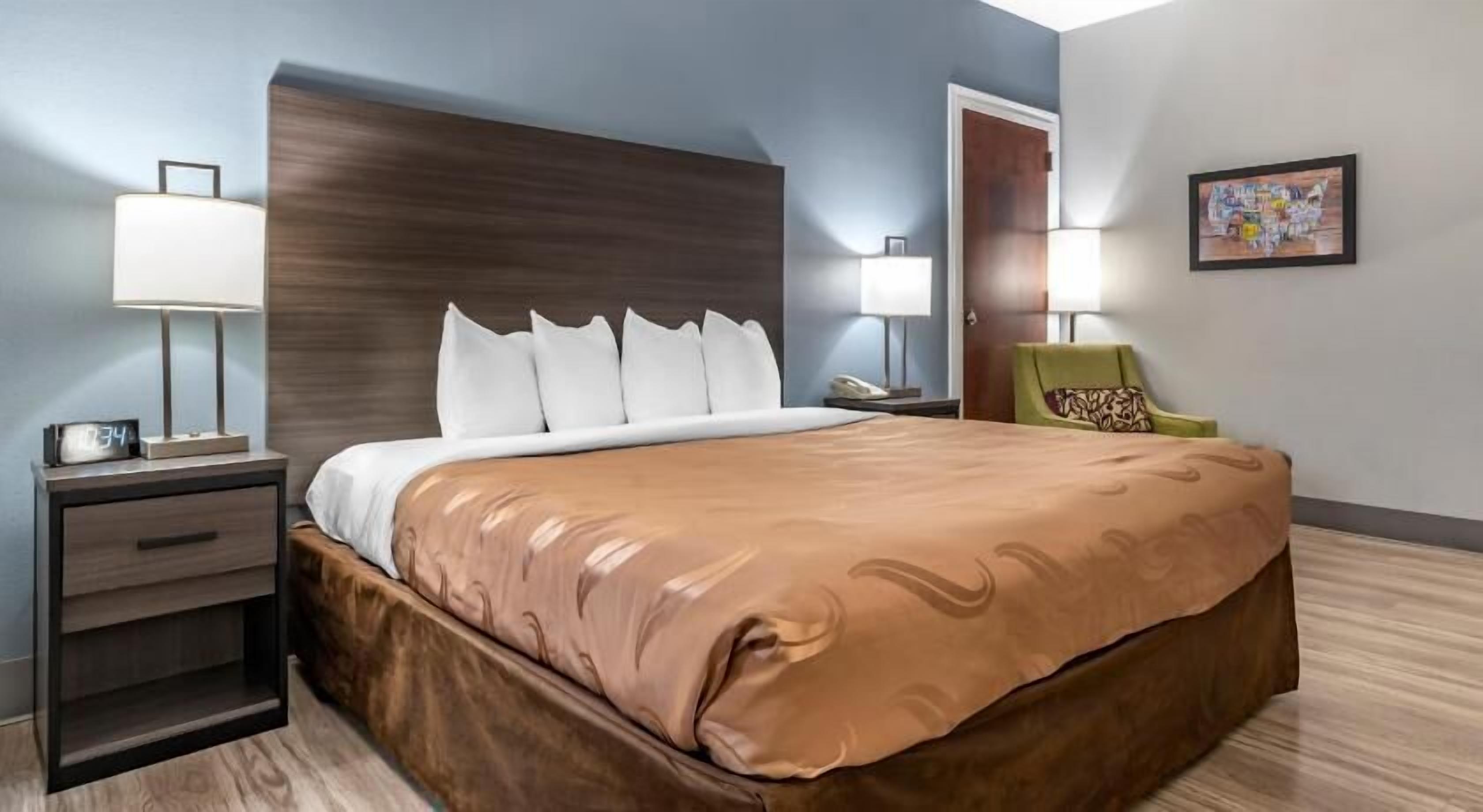 Desk, laptop workspace, blackout curtains, iron/ironing board