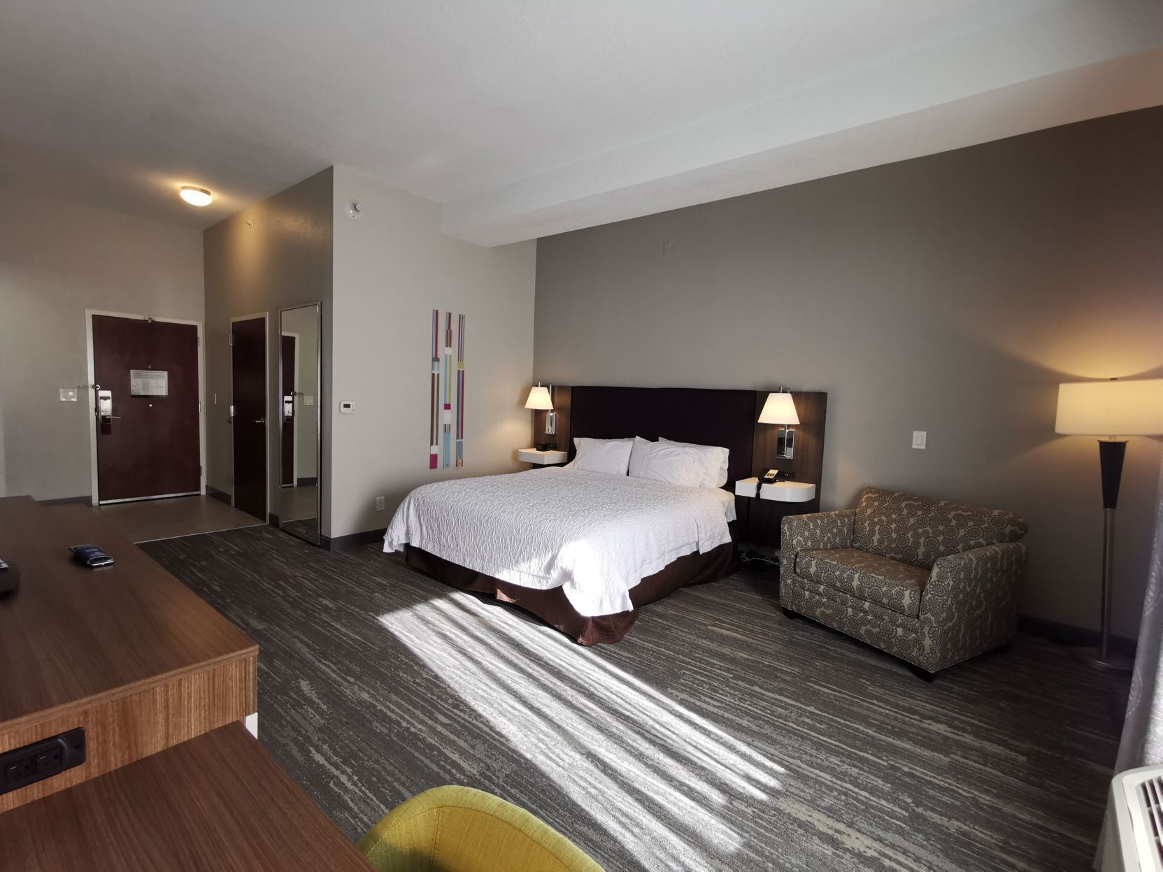 Premium bedding, down comforters, pillowtop beds, in-room safe