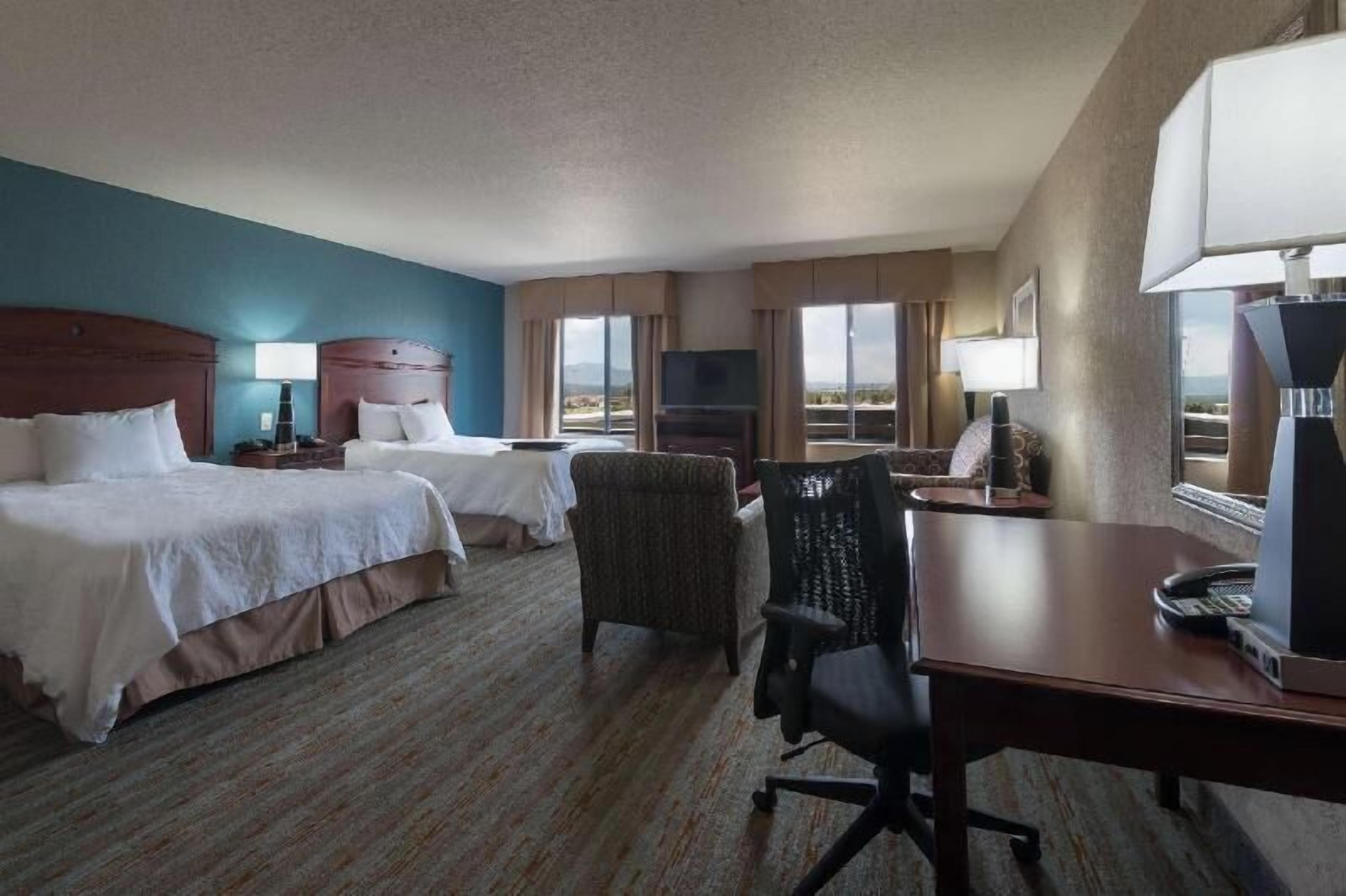 Premium bedding, down comforters, pillowtop beds, in-room safe