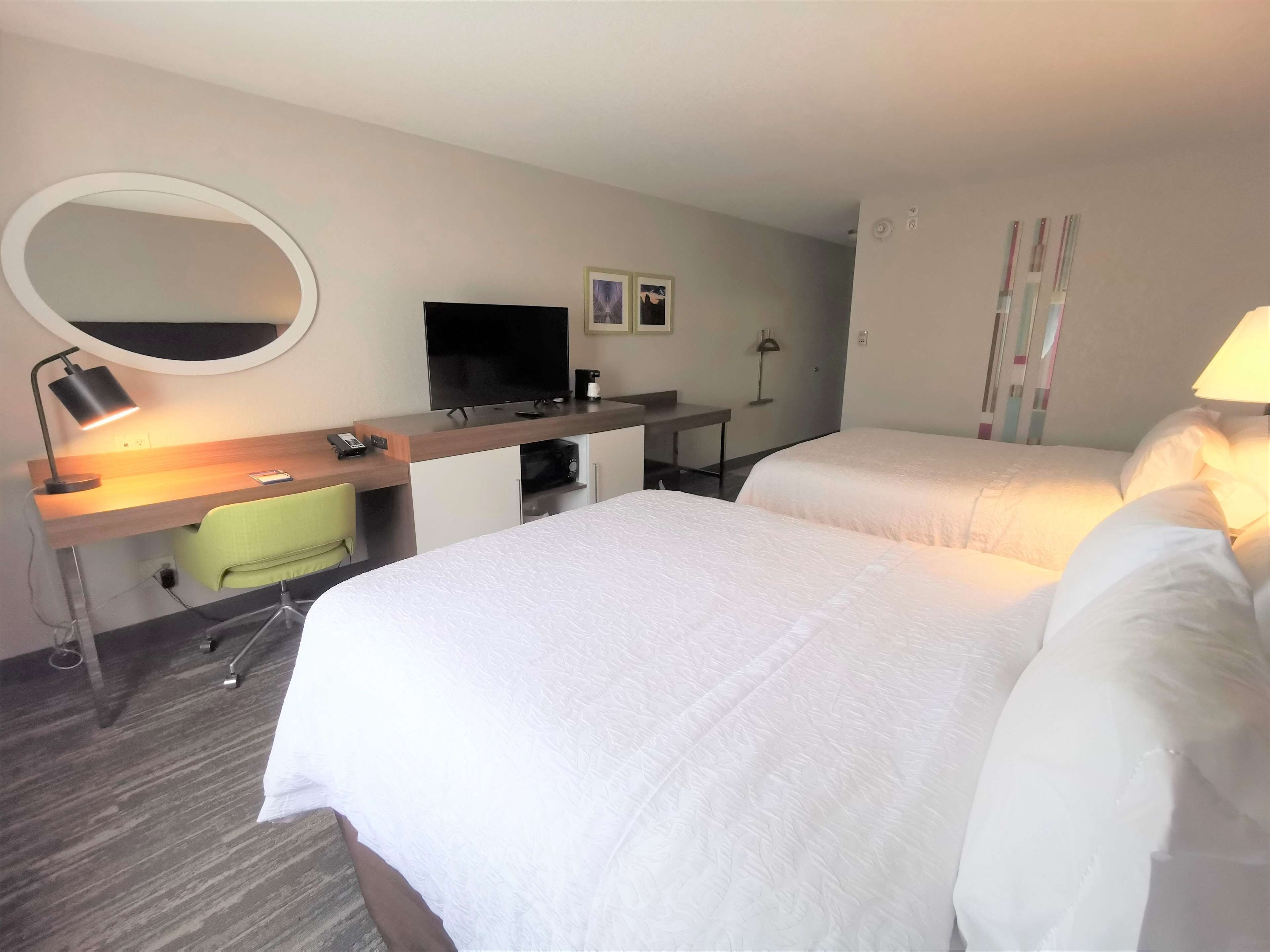 Premium bedding, down comforters, pillowtop beds, in-room safe