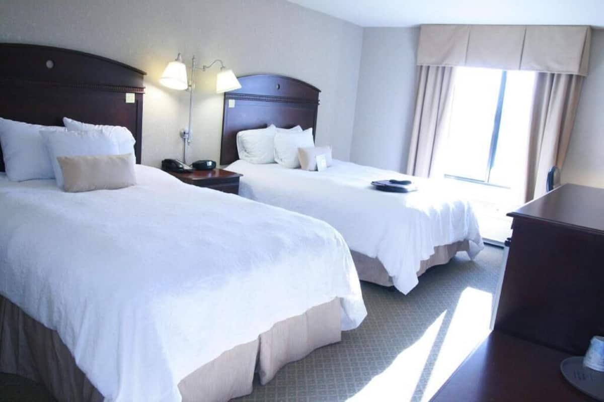 Premium bedding, down comforters, pillowtop beds, in-room safe