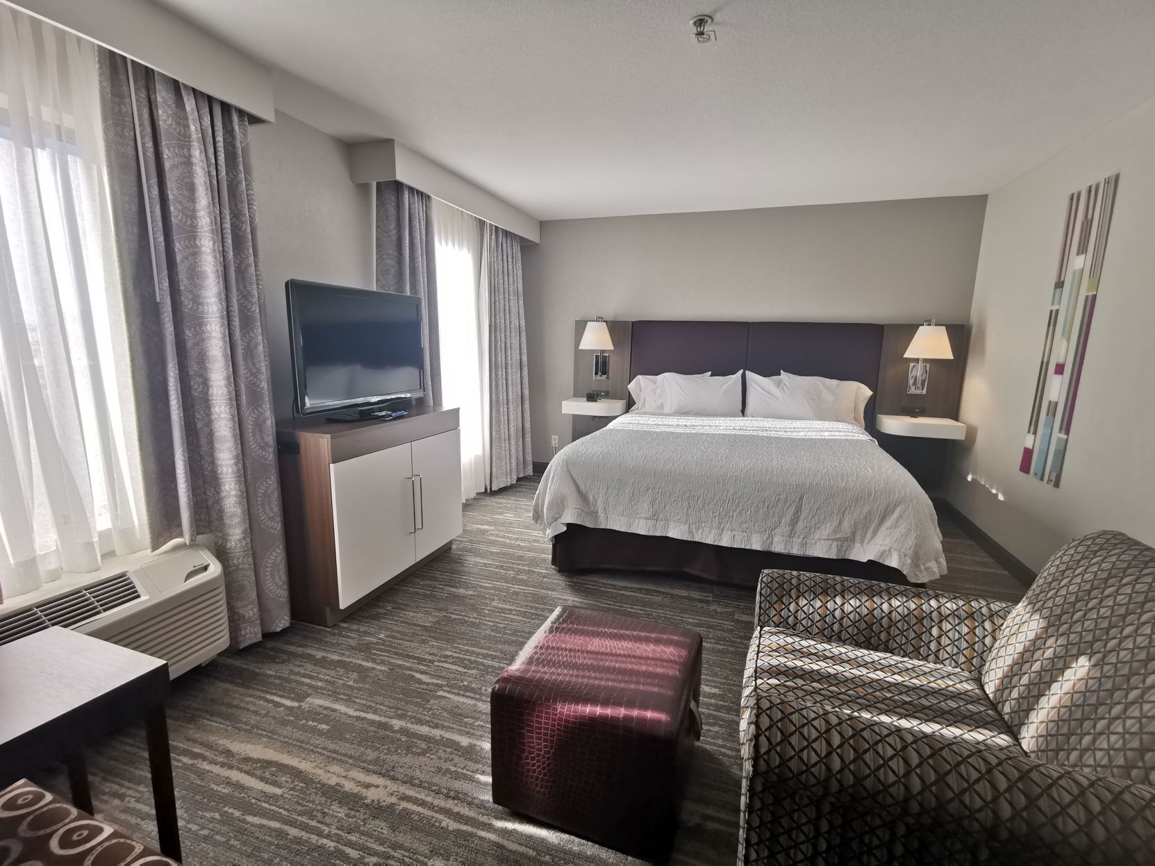 Premium bedding, down comforters, pillowtop beds, in-room safe