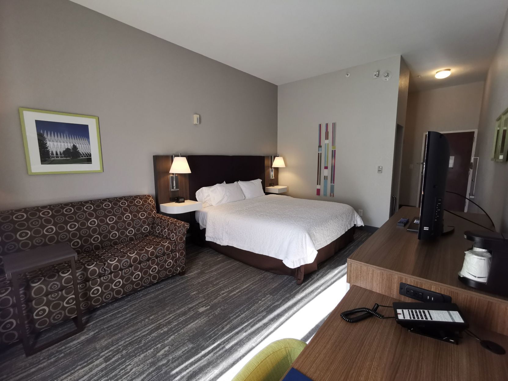 Premium bedding, down comforters, pillowtop beds, in-room safe