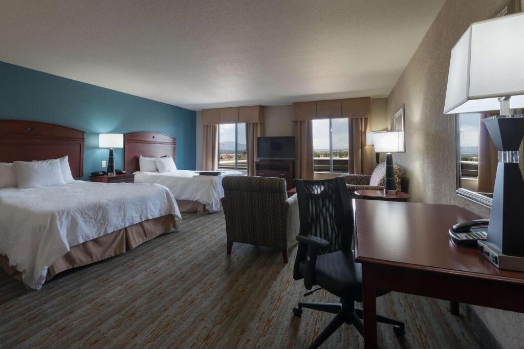 Premium bedding, down comforters, pillowtop beds, in-room safe