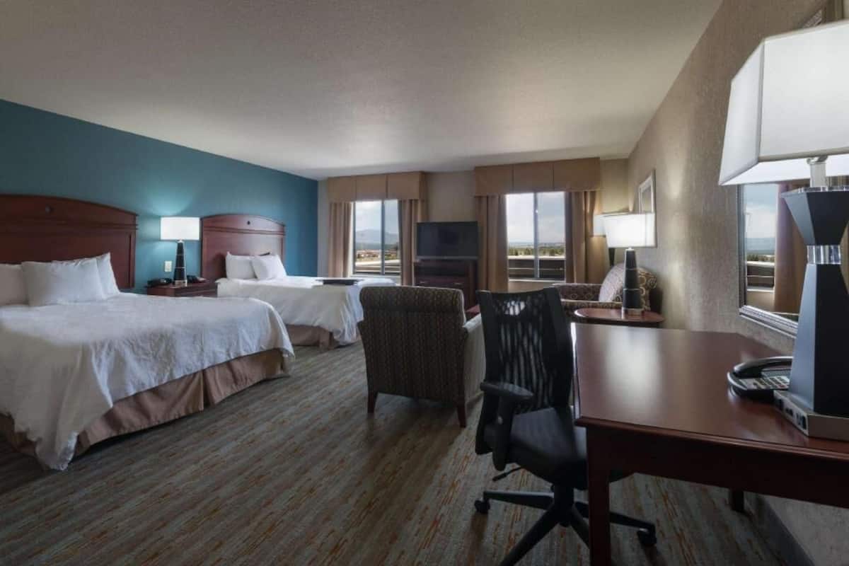 Premium bedding, down comforters, pillowtop beds, in-room safe