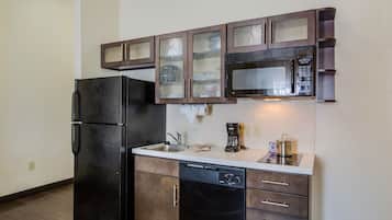 Fridge, microwave, coffee/tea maker, cookware/dishes/utensils