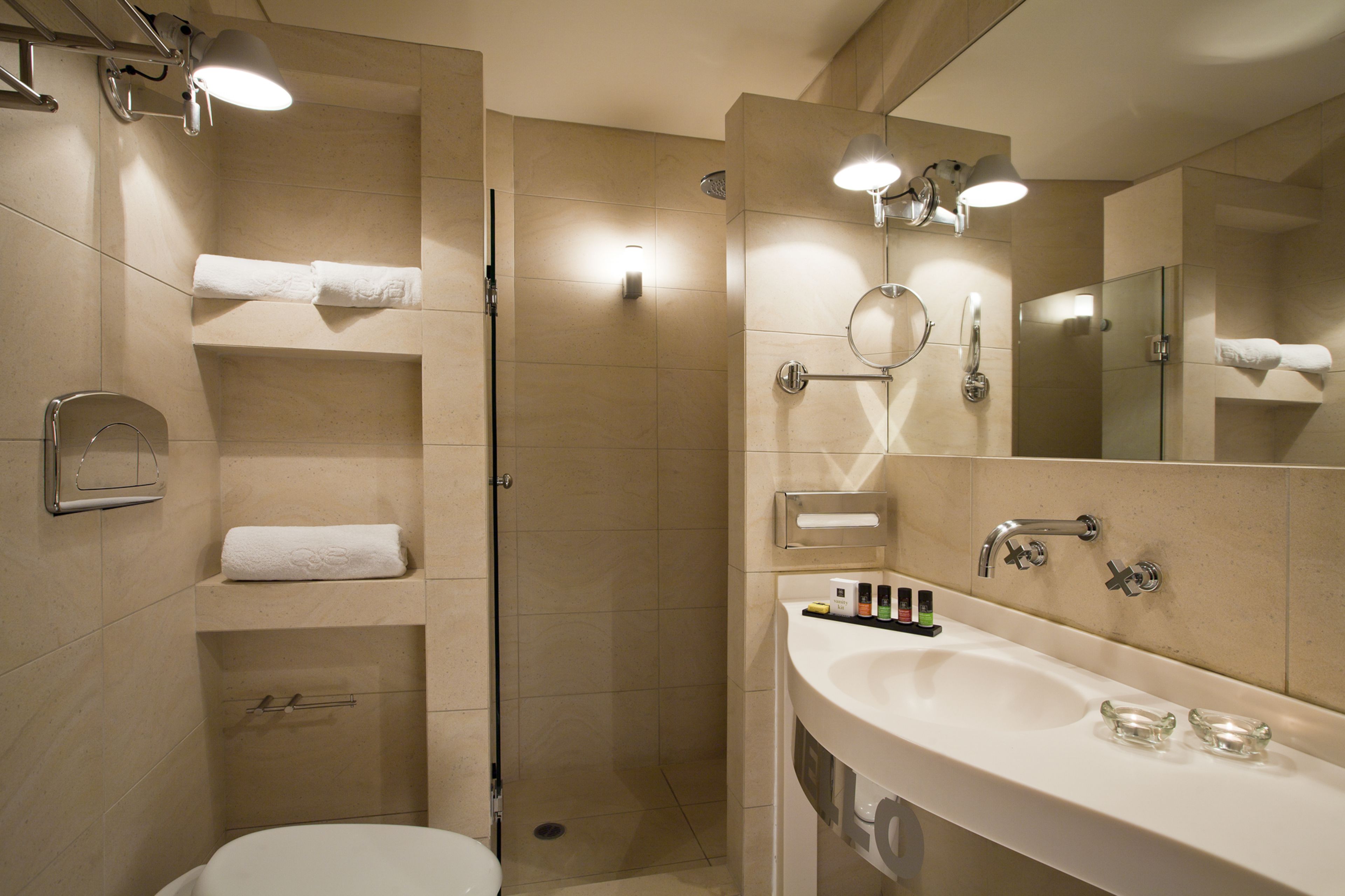 shower, rainfall showerhead, designer toiletries, hair dryer