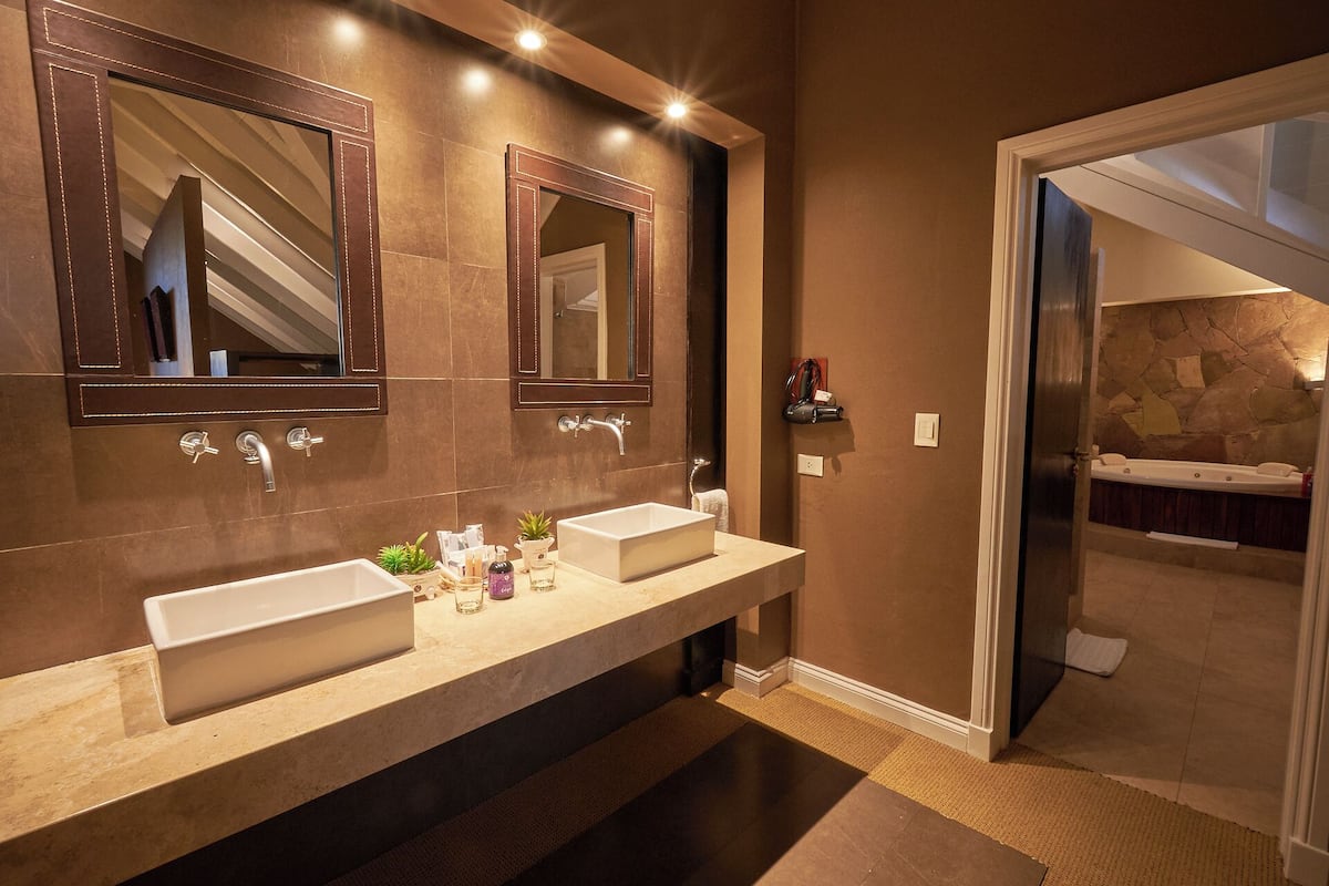 design suite, 1 king bed | bathroom | rainfall showerhead, free toiletries, hair dryer, bidet