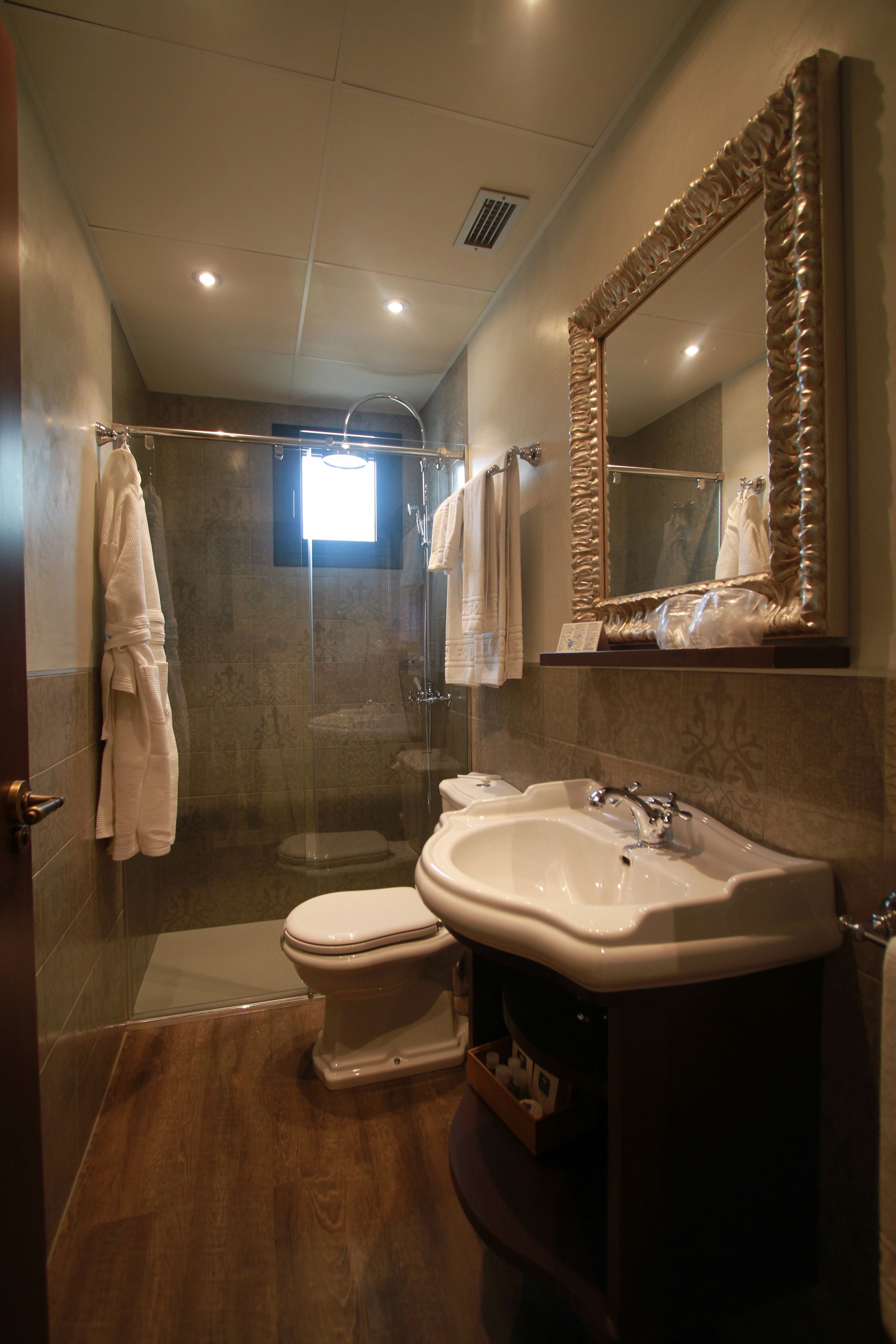 double room (vista plaza) | bathroom | shower, free toiletries, hair dryer, bathrobes