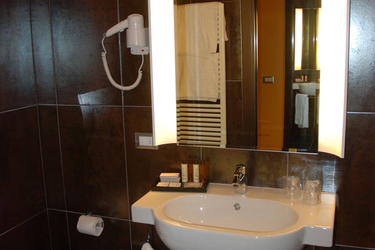 shower, rainfall showerhead, hair dryer, slippers