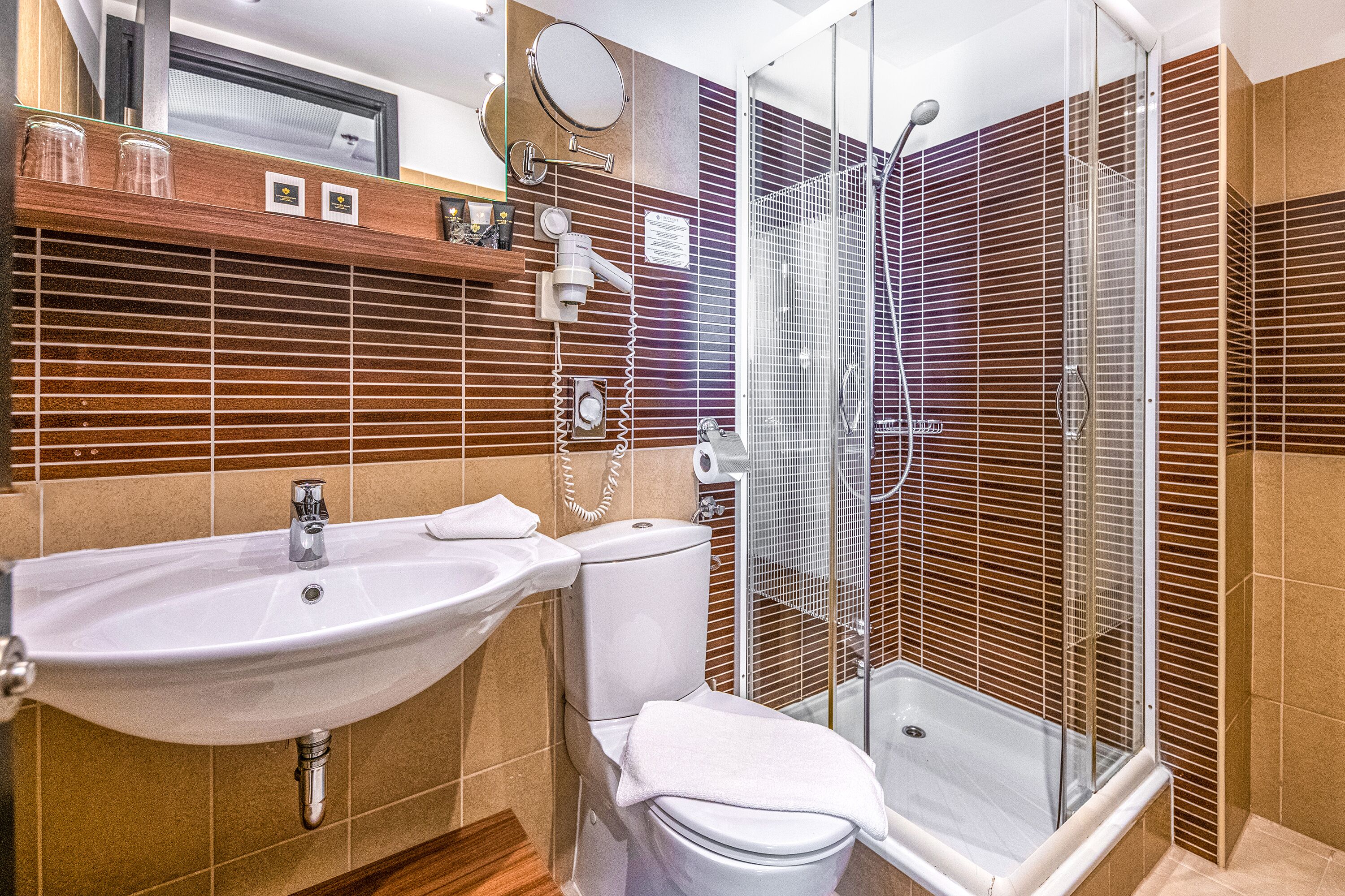 shower, free toiletries, hair dryer, towels