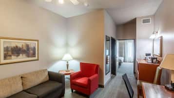 Desk, laptop workspace, blackout drapes, iron/ironing board