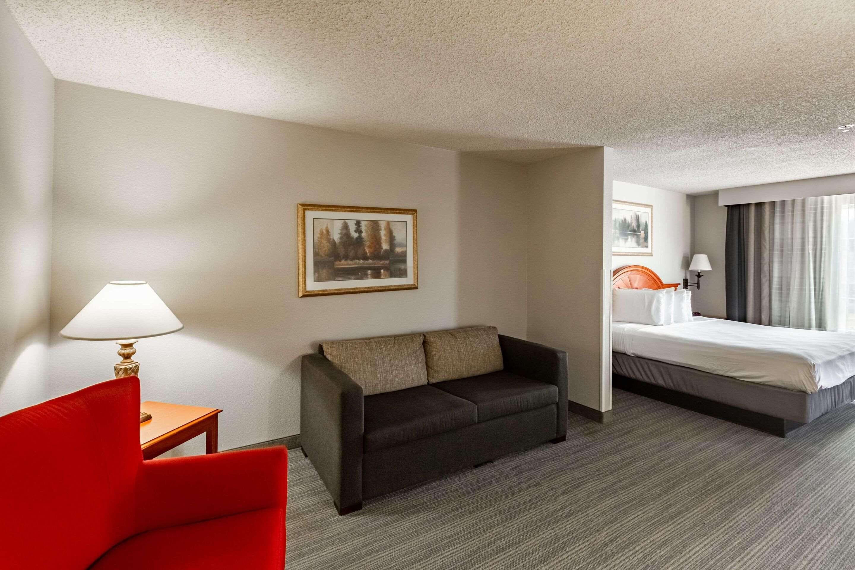 desk, laptop workspace, blackout curtains, iron/ironing board