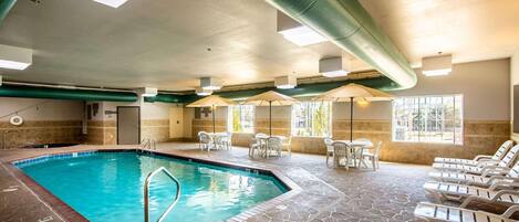 Indoor pool, pool umbrellas, sun loungers