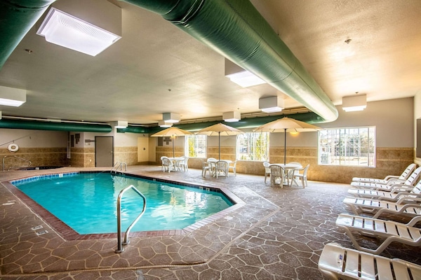 Indoor pool, pool umbrellas, sun loungers