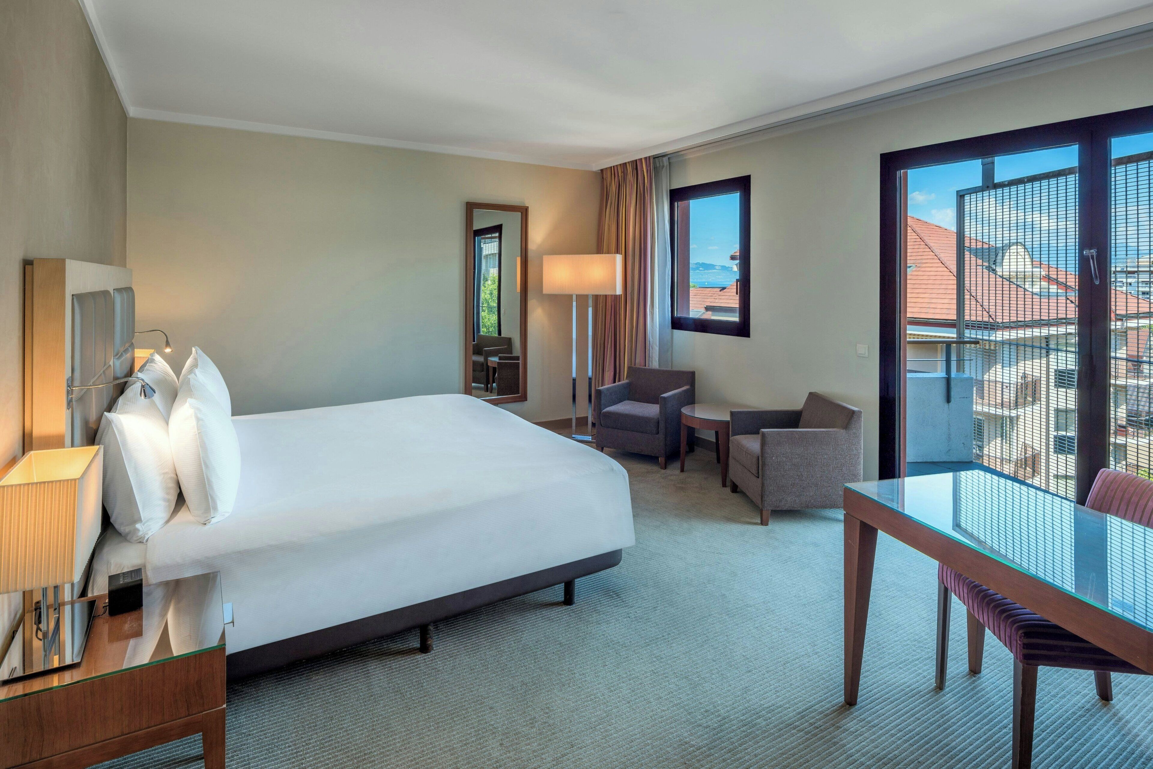 Habitación Confort doble | Ropa de cama de alta calidad, minibar, caja fuerte y escritorio