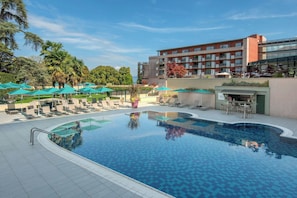 Seasonal outdoor pool, pool loungers
