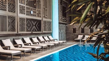 Seasonal outdoor pool, pool loungers