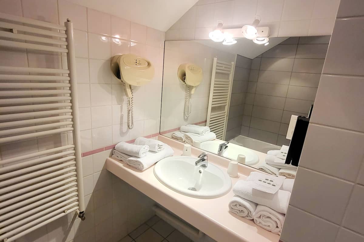 shower, eco-friendly toiletries, hair dryer, towels