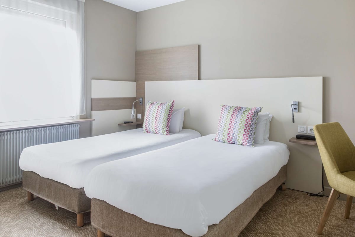 standard room, 2 single beds | blackout curtains, soundproofing, free cots/infant beds