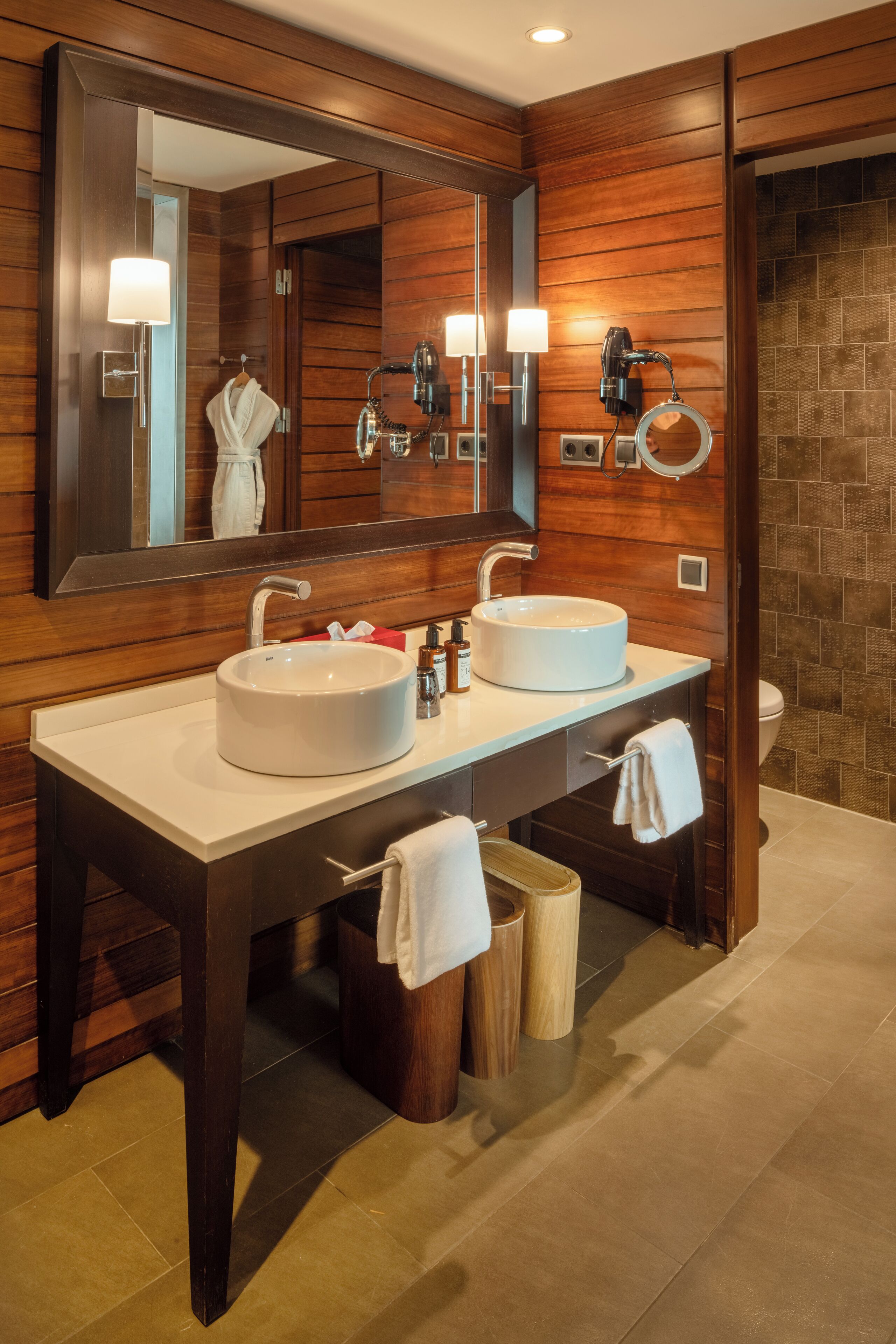 eco-friendly toiletries, hair dryer, bathrobes, slippers