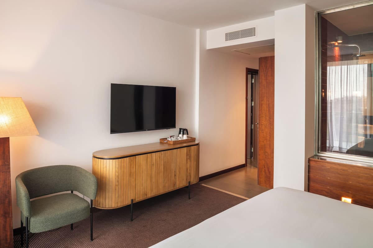 Minibar, blackout curtains, iron/ironing board, free WiFi